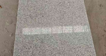 吉林市芝麻白光面毛板