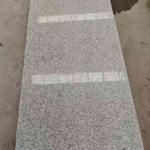 吉林市芝麻白光面毛板